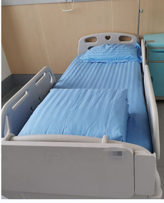 Lençóis de cama de algodão 100% em linhas azuis e brancas