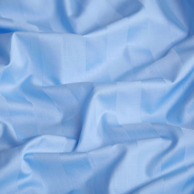 Lençóis de cama de algodão 100% em linhas azuis e brancas